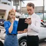 Woman choosing rental car reservation